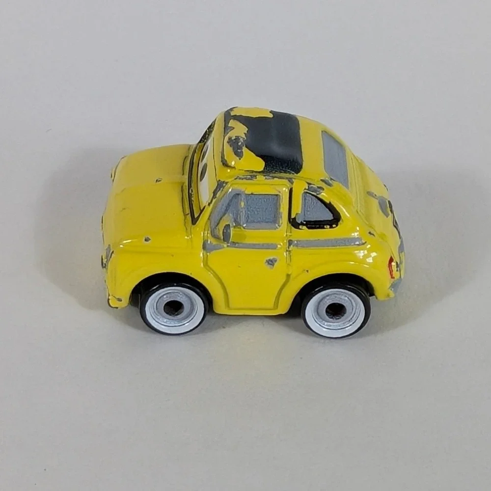 Disney Pixar Cars Luigi Fiat 500 Yellow Micro Drifters Mattel FBX66 Mini Racers